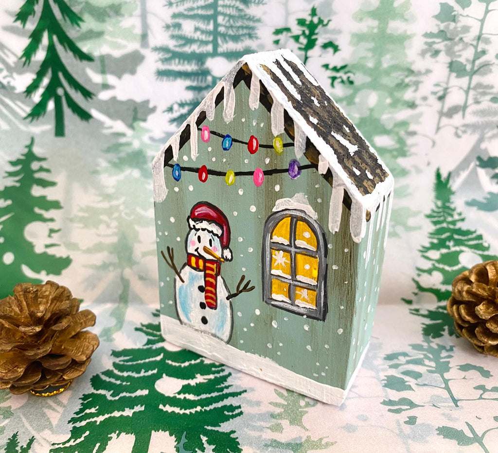 Adorno Navideño en forma de casita de madera