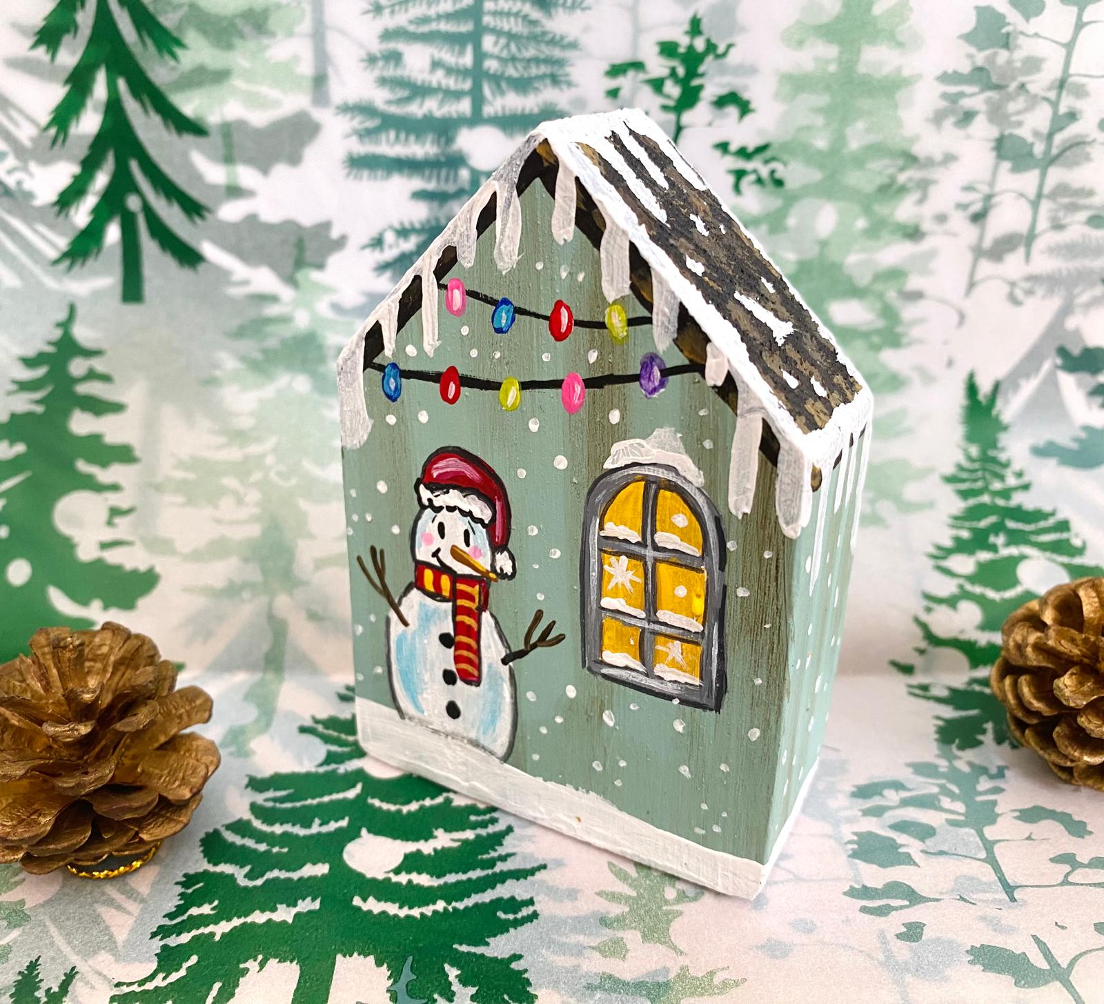 Adorno Navideño en forma de casita de madera