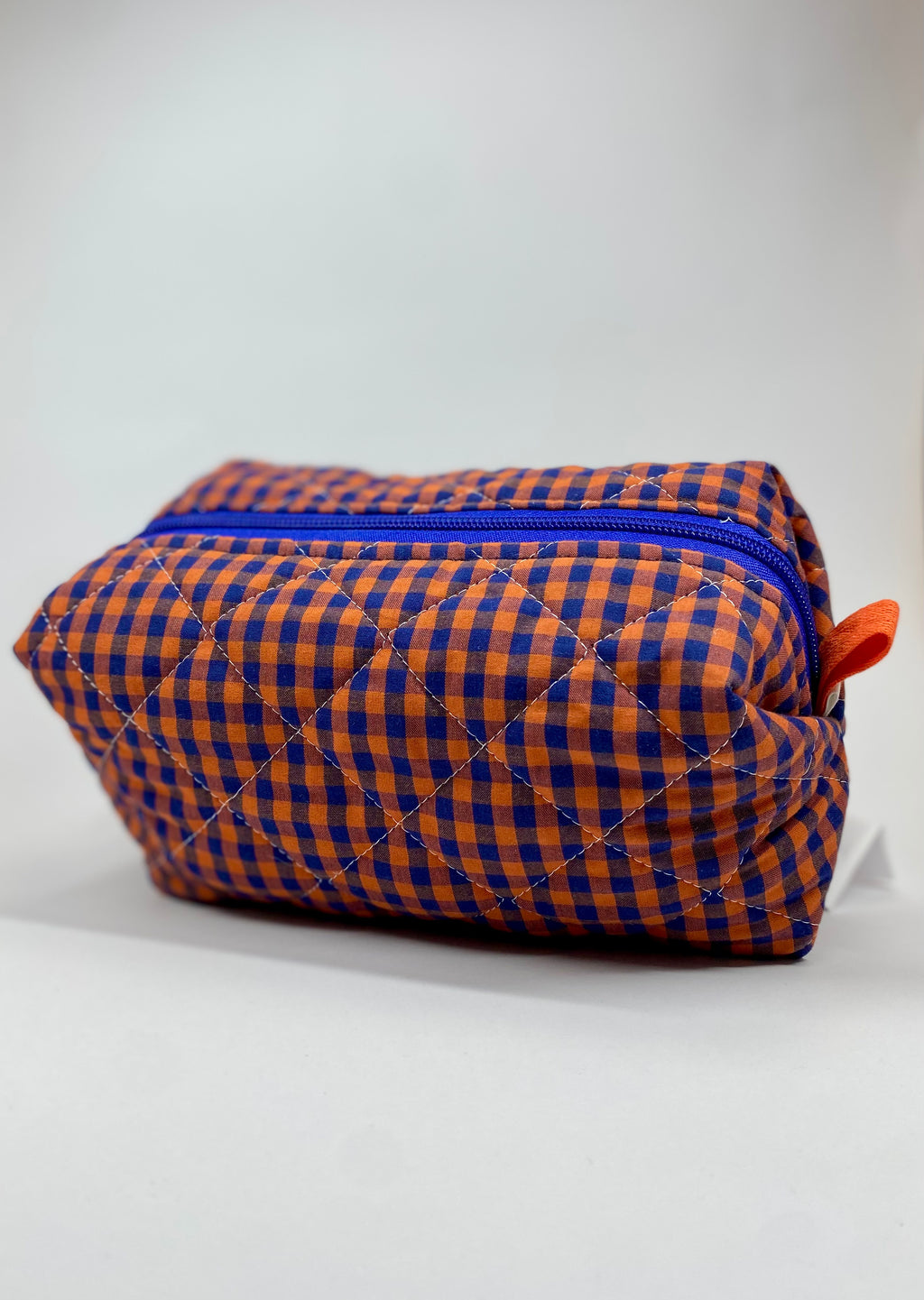 Neceser acolchado rectangular azul y naranja