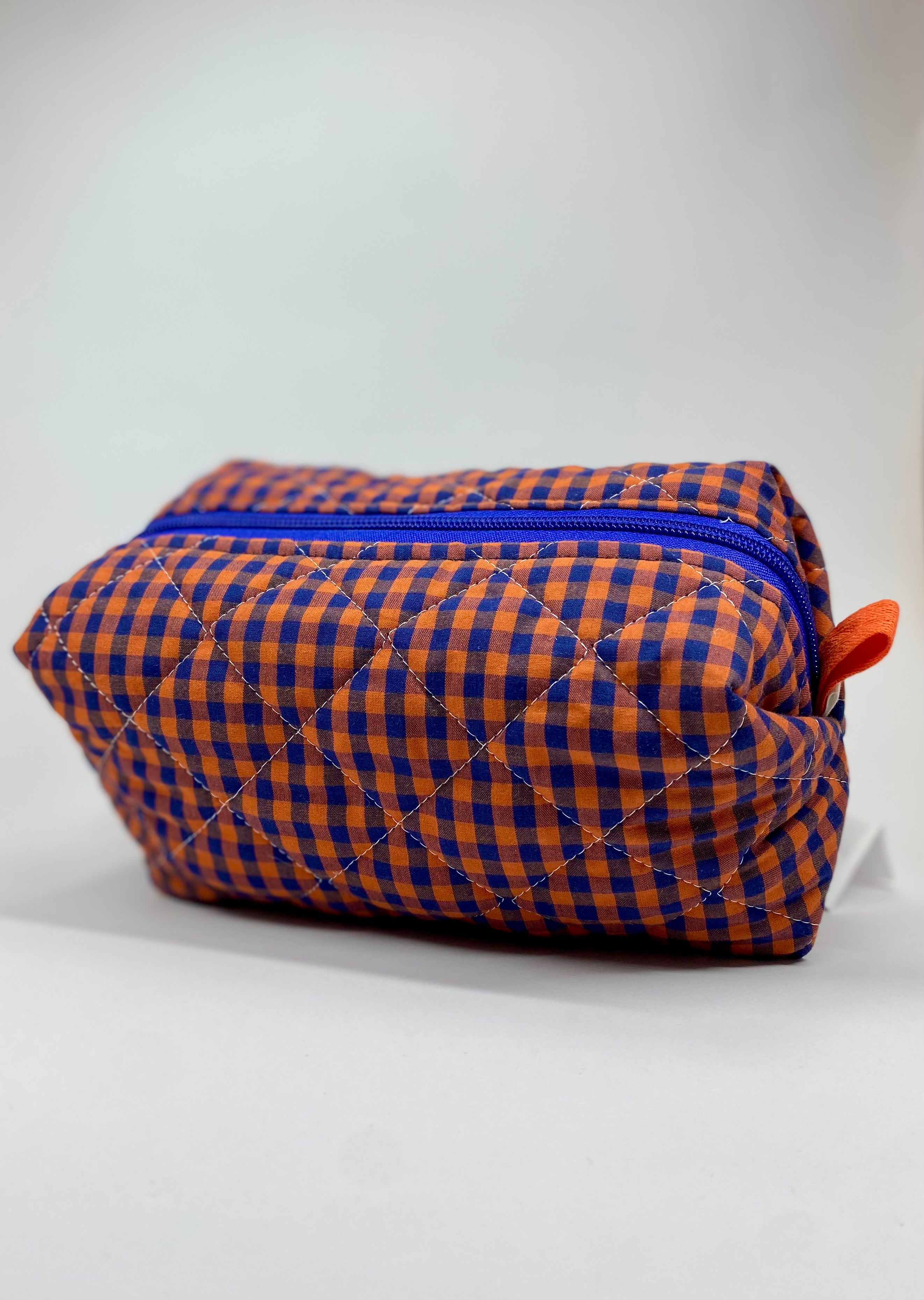 Neceser acolchado rectangular azul y naranja