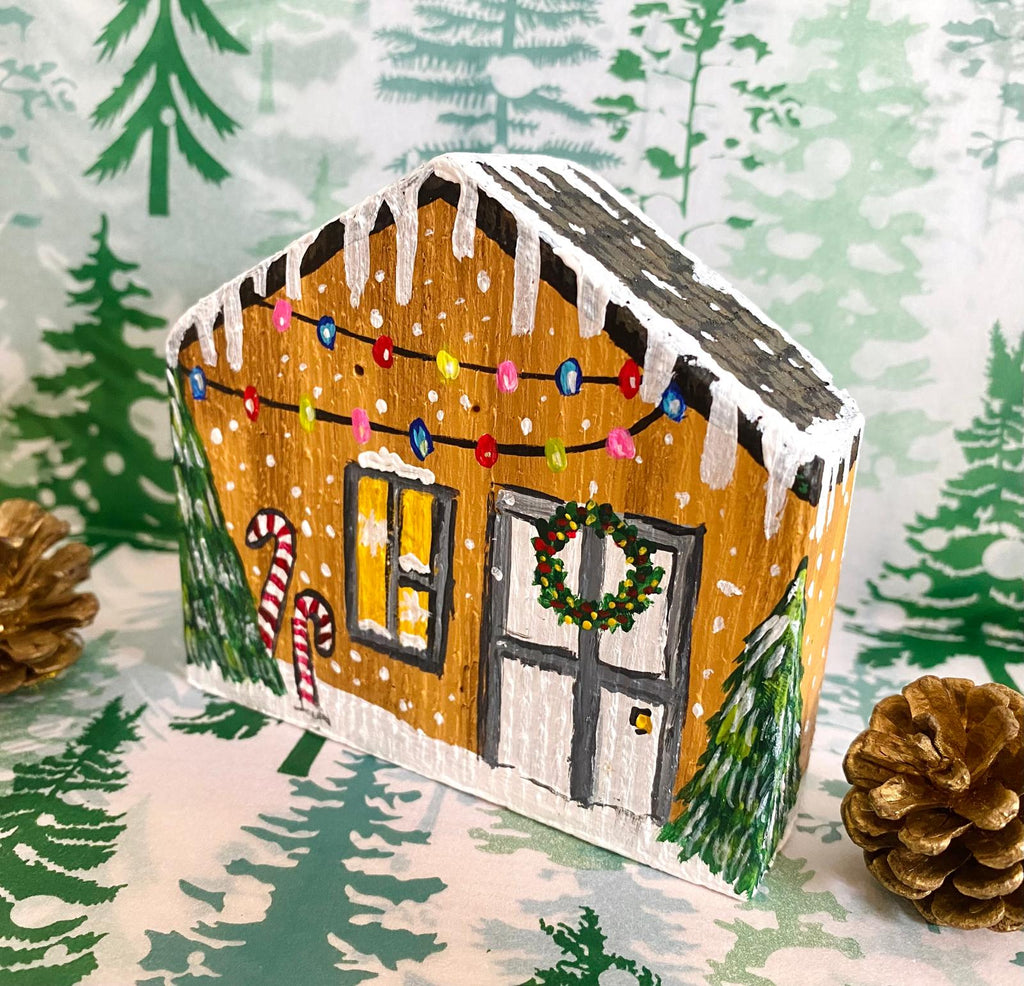 Adorno Navideño en forma de casita de madera