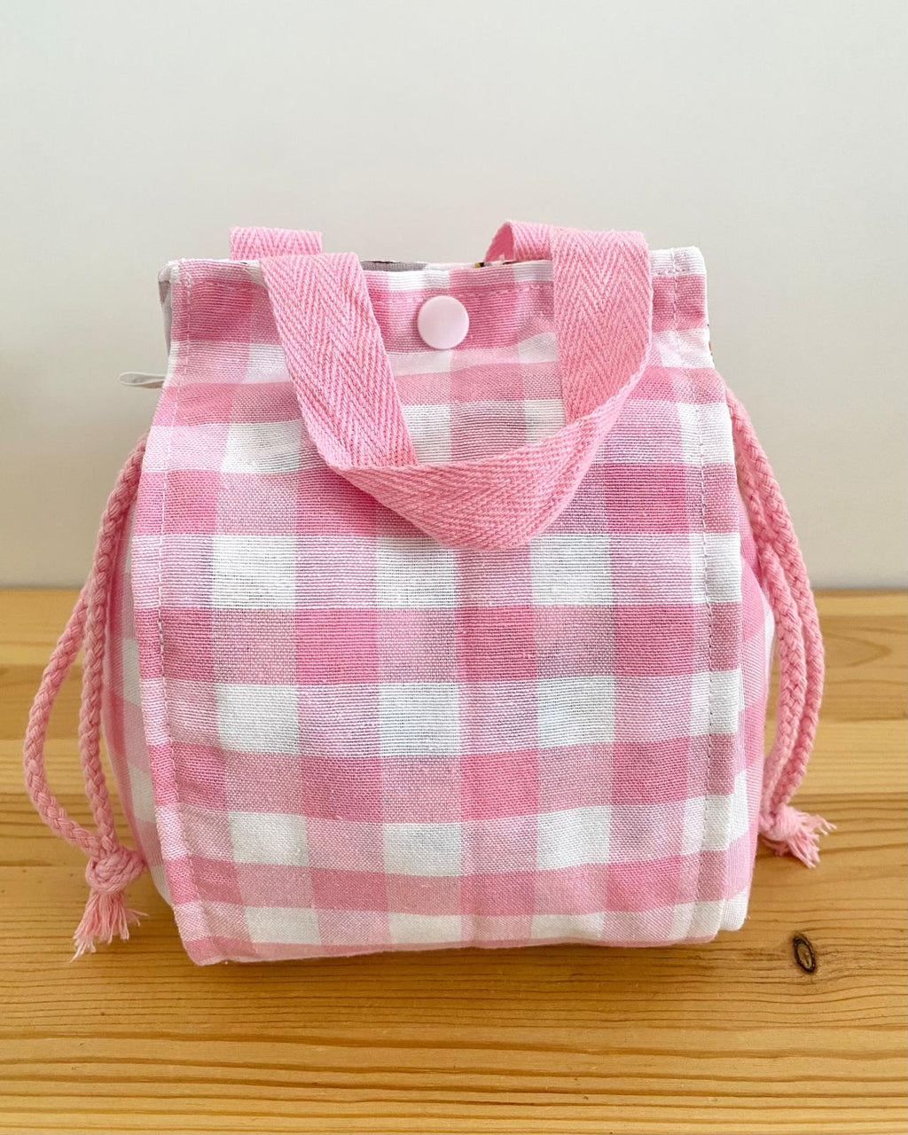 Neceser con solapas cuadros rosa