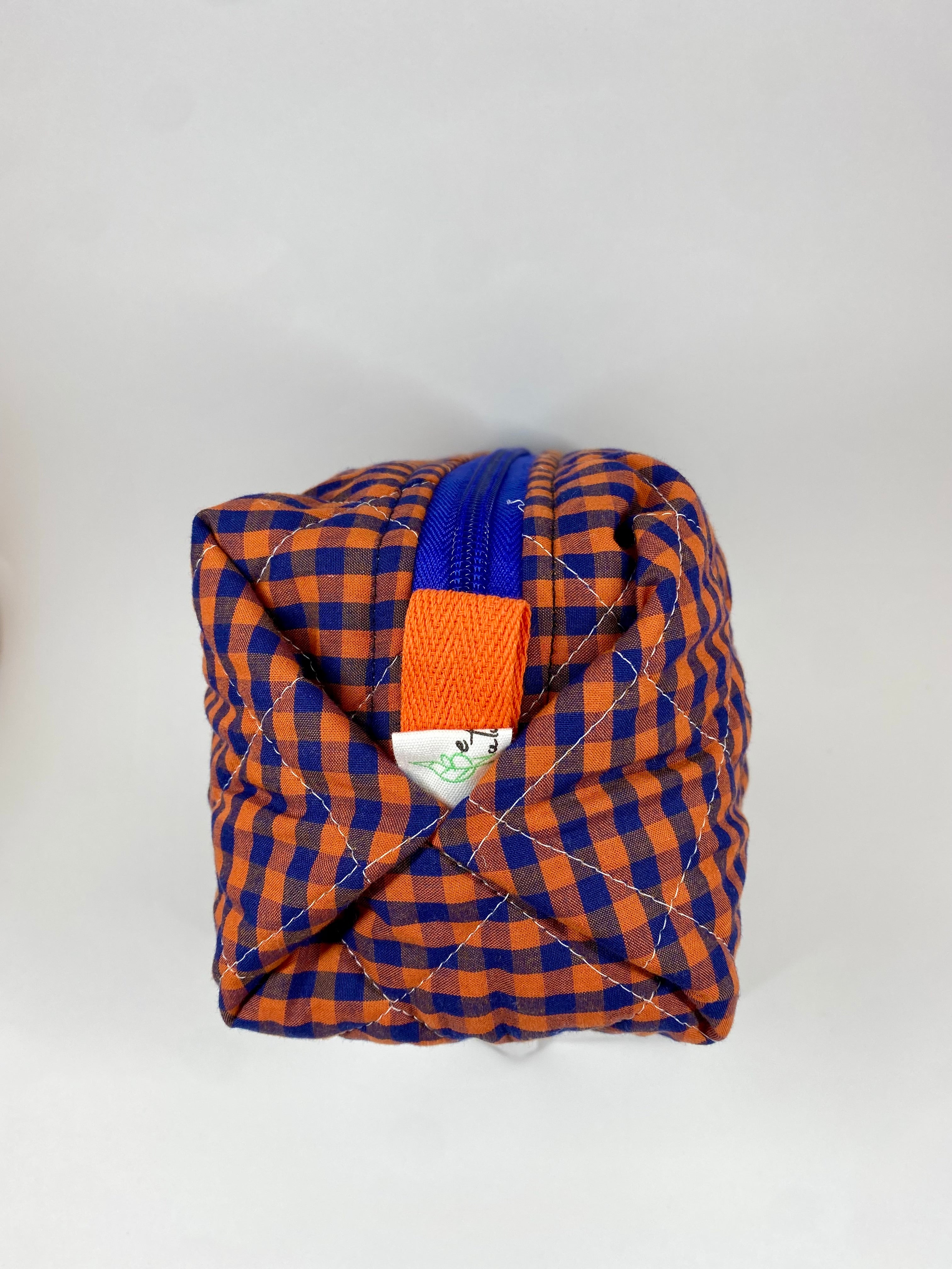 Neceser acolchado rectangular azul y naranja
