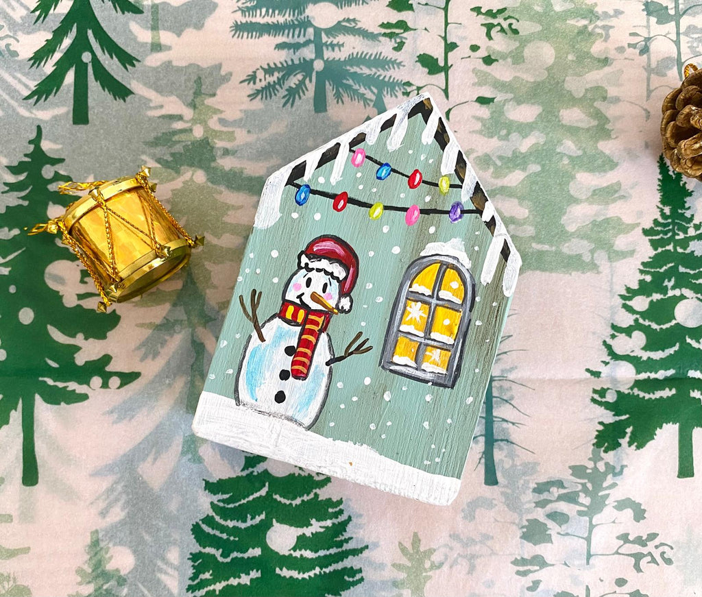 Adorno Navideño en forma de casita de madera