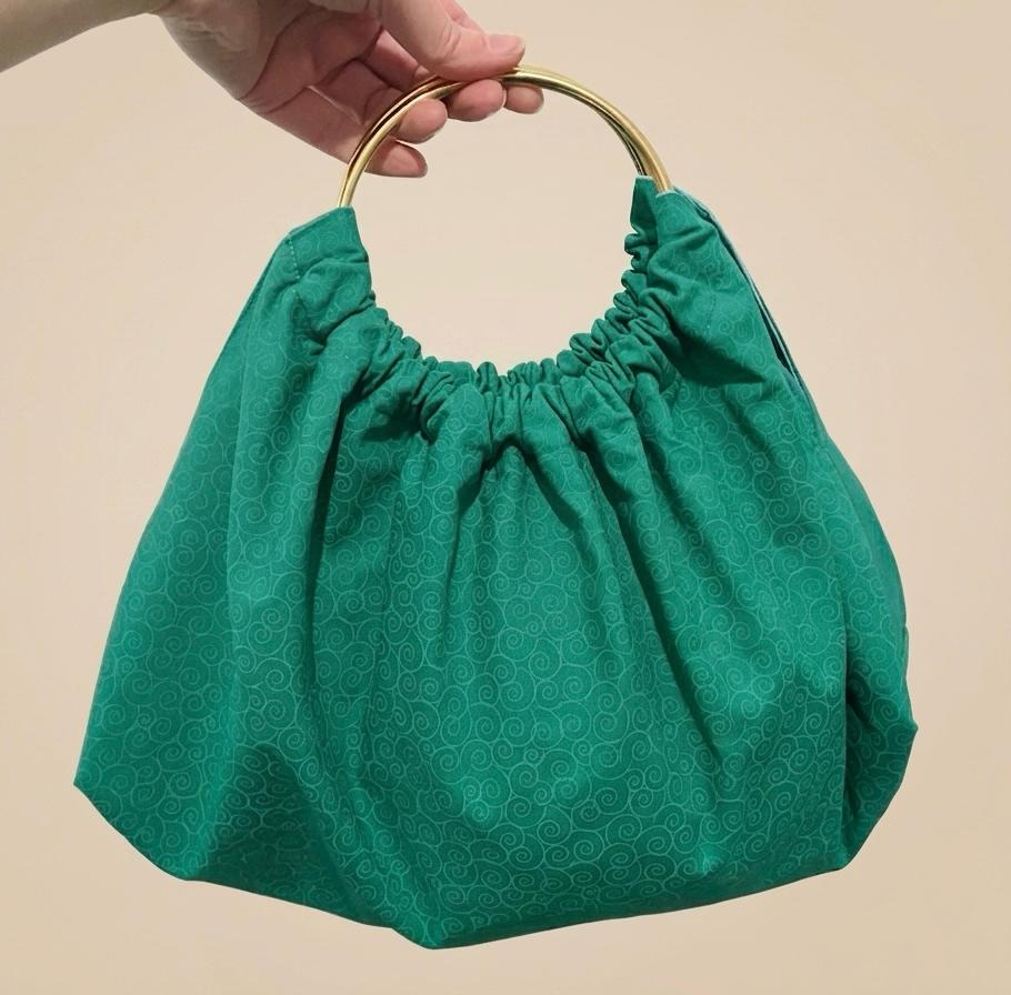 Bolso Verde asas doradas